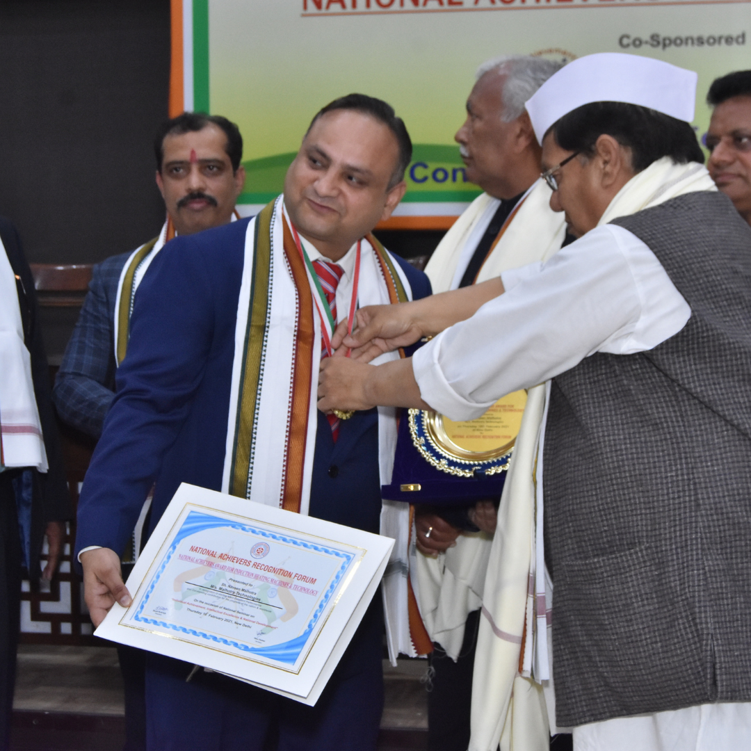 Medal being awarded at National Achievers Forum